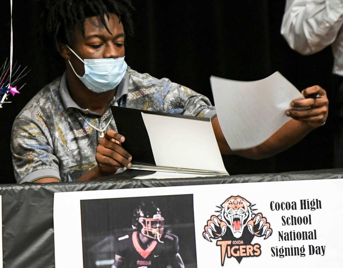 Kionte Curry signs his letter of intent during Signing Day at Cocoa High School on Feb. 3, 2021. 